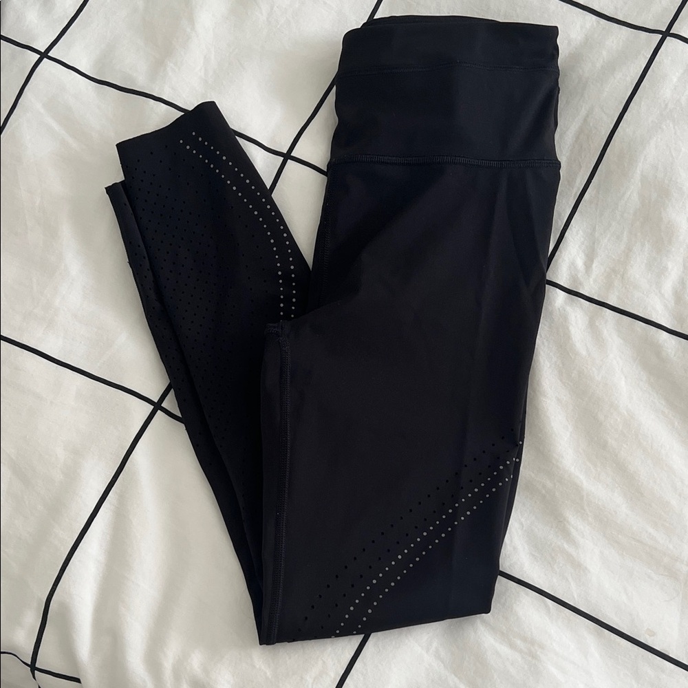 Athleta accelerate laser cut 7/8 tight size small